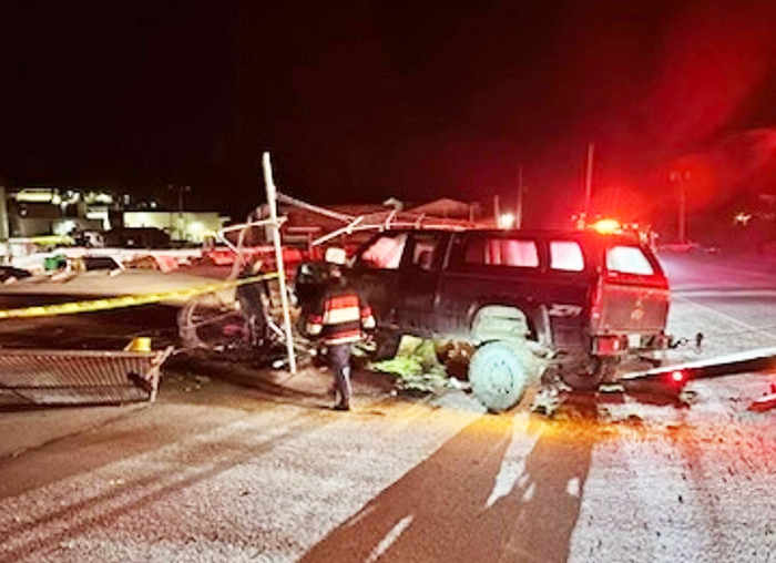 Truck hits Windsor Plywood fence