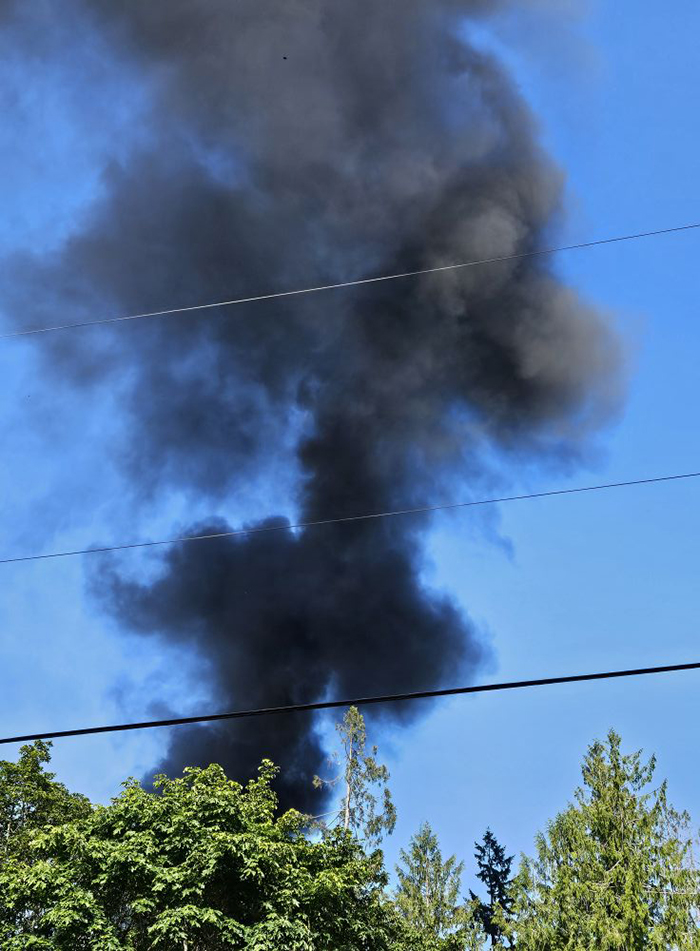 Camper burns on Main Street
